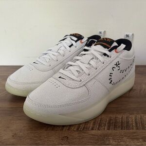 White Sneakers with Black and Orange Accents